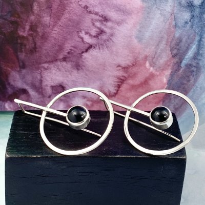  Silverörhängen, Onyx