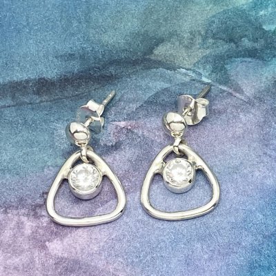 Silverörhängen, Zircon