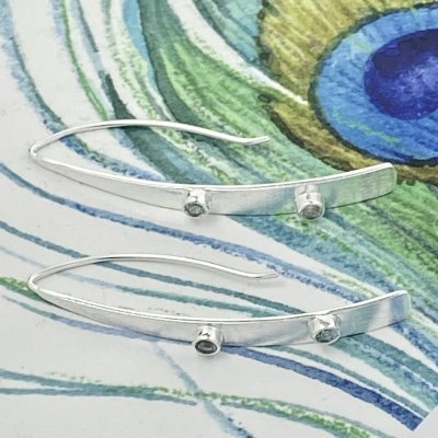 Silverörhängen, Zircon